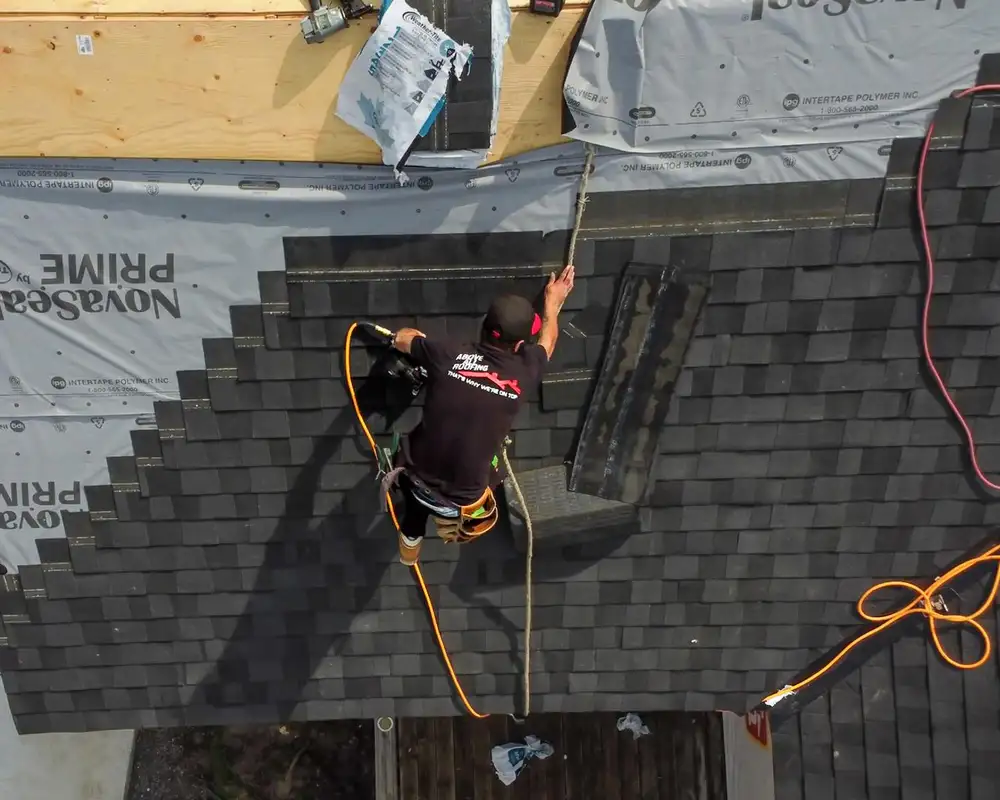 New roofing with detailed valley and ridge work