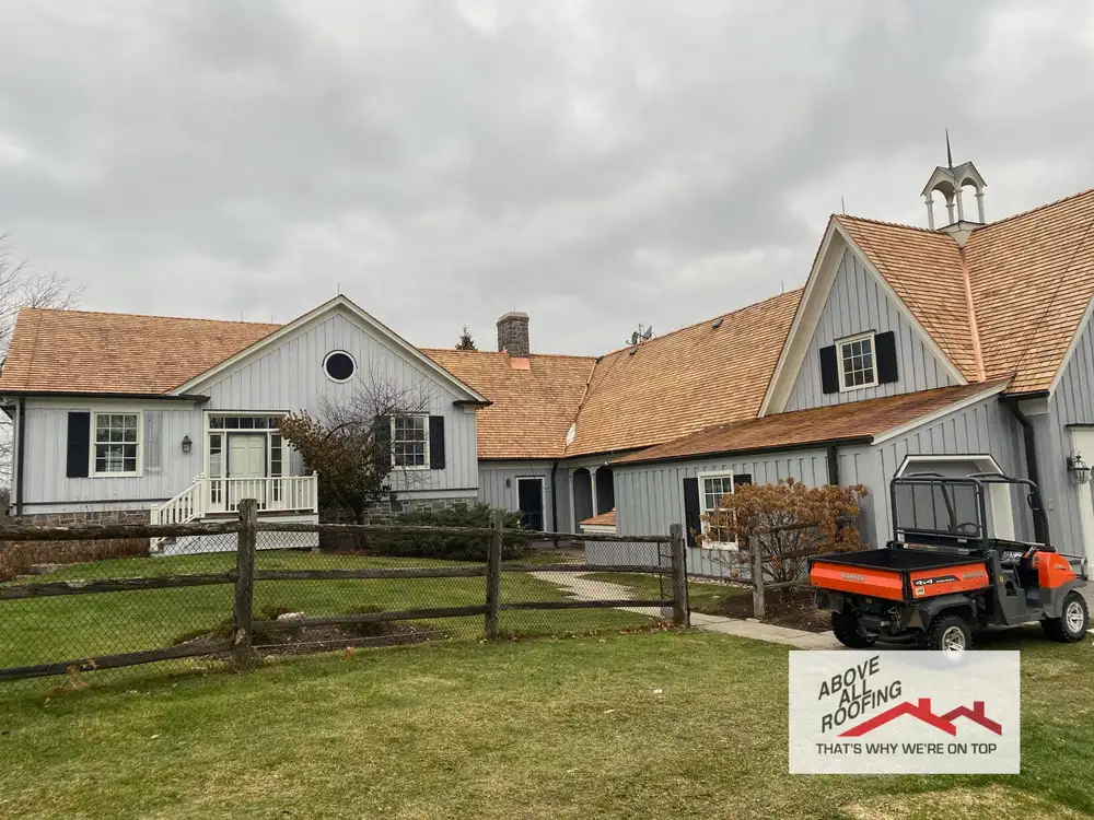 Completed roof and eavestrough on a large home